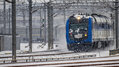 DF11G牵引Z205通过大雪中的北京南站.jpg
