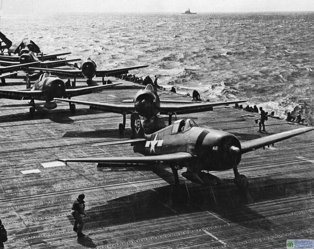 F6F-5 Hellcats of (VF) 80 prepare to launch from the aircraft carrier Ticonderoga (CV 14)..jpg