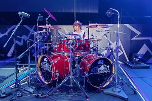 Megu with drums.jpg